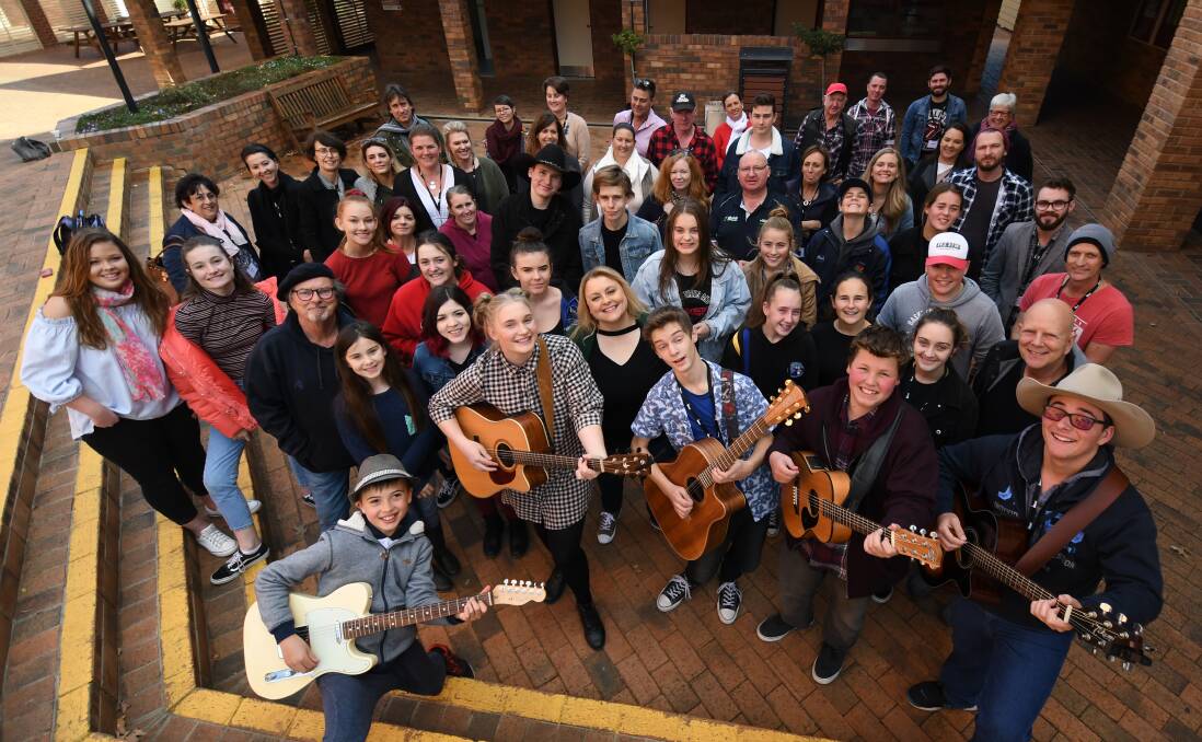 COUNTRY MUSIC: CMAA Junior Country Music Academy students and mentors in Tamworth. Photo: Gareth Gardner