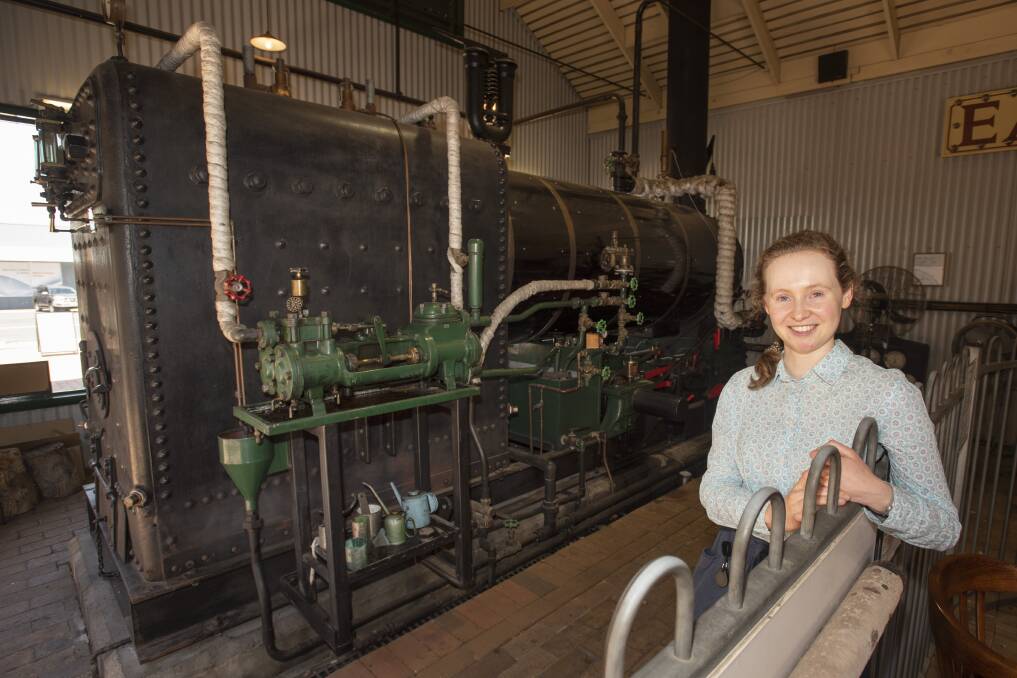 ANNIVERSARY: Tamworth Regional Council cultural collections officer Anna Gregory with the John Fowler steam engines. Photo: Peter Hardin 071119PHC021