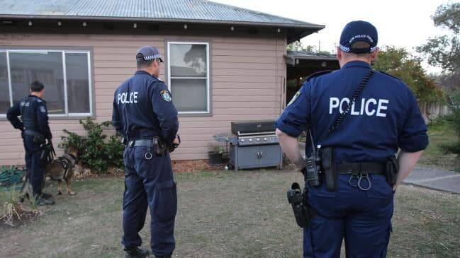 ICE CASTLE: Police at one of the homes in Tamworth that were raided as part of the Strike Force Radius operation earlier this year. Photo: NSW Police