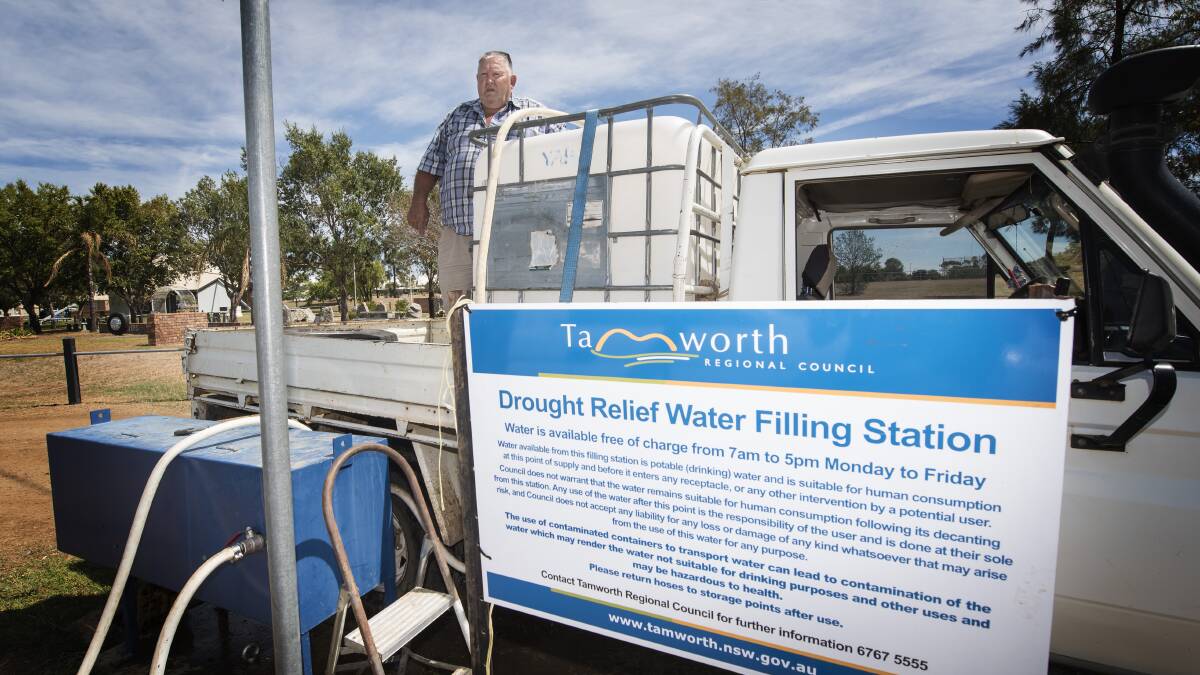 WATER FLOWS: Farmer Darryl Lavender fills up at the Drought Relief Water Filling Station. Photo: Peter Hardin