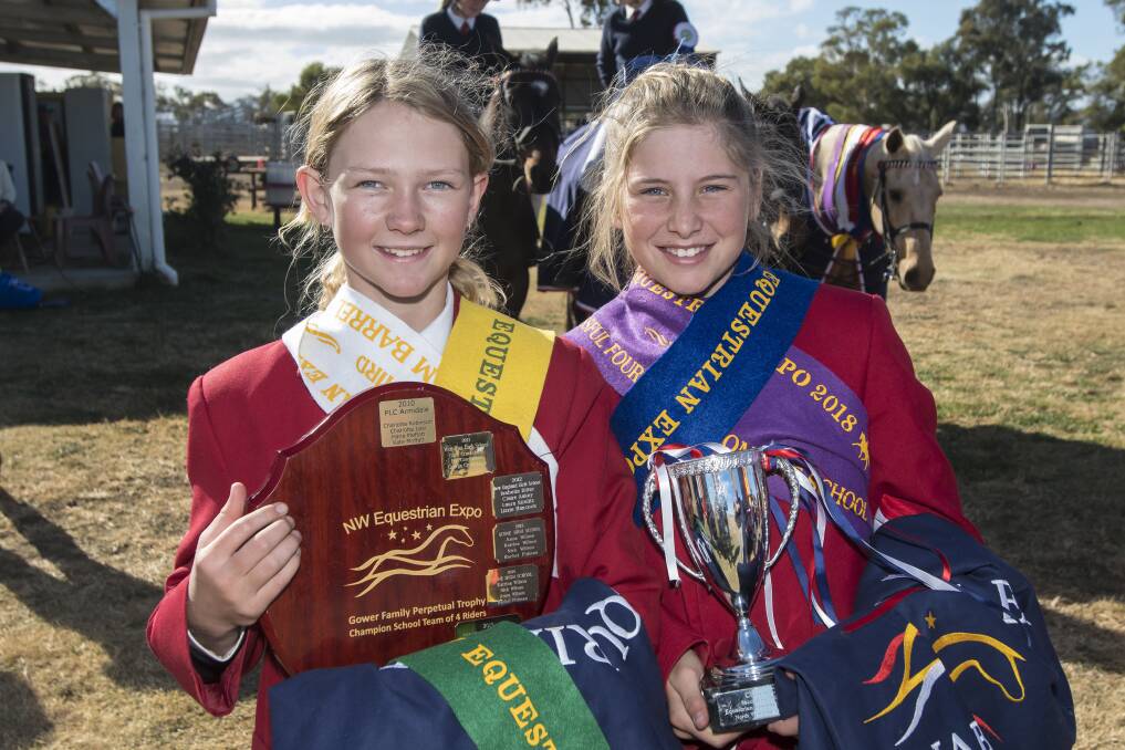 GIDDY UP: Calrossy Equestrian students Venessa Baker and Hannah Thurn. The girls competed in the North West Equestrian Expo. Photo: Peter Hardin

