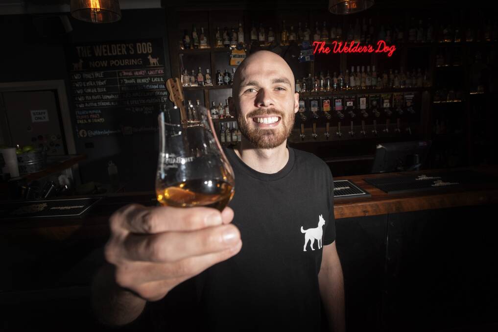 SIP IT: The Welder's Dog bar manager Ben Draper will run a no nonsense guide to whisky for people who want to learn to drink it. Photo: Peter Hardin 240521PHF004