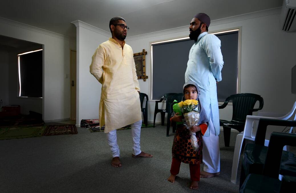 DIALOGUE: At Friday prayer, men and visitors discussed and grieved the impact of the New Zealand mosque massacre. Photo: Gareth Gardner