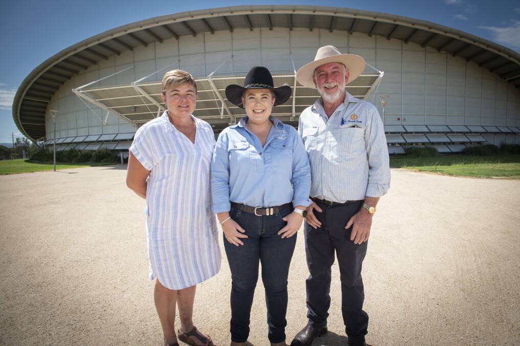 ALL SMILES: Tamworth Pastoral and Agricultural Association treasurer Diana Brown, competitor and program coordinator Emma Bailey and Tamworth Regional Council mayor Russell Webb. Photo: Peter Hardin