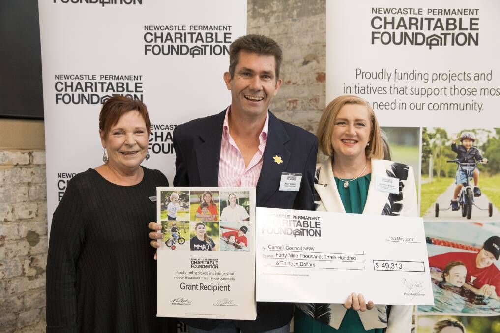 DONATION: Newcastle Permanent Charitable Foundation director Julie Ainsworth, Paul Hobson from Cancer Council NSW, Charitable Foundation director Jennifer Leslie.