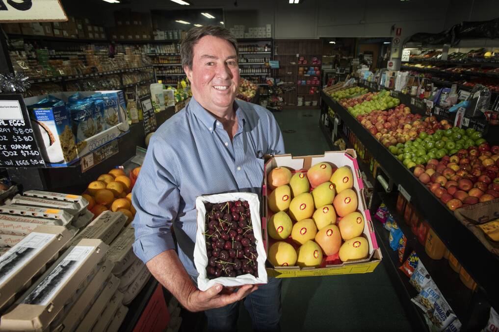 FESTIVE FARE: Farmer Bob's Fruit Market owner Brendon North has ordered in seafood for the first time this year. Photo: Peter Hardin 211220PHC005