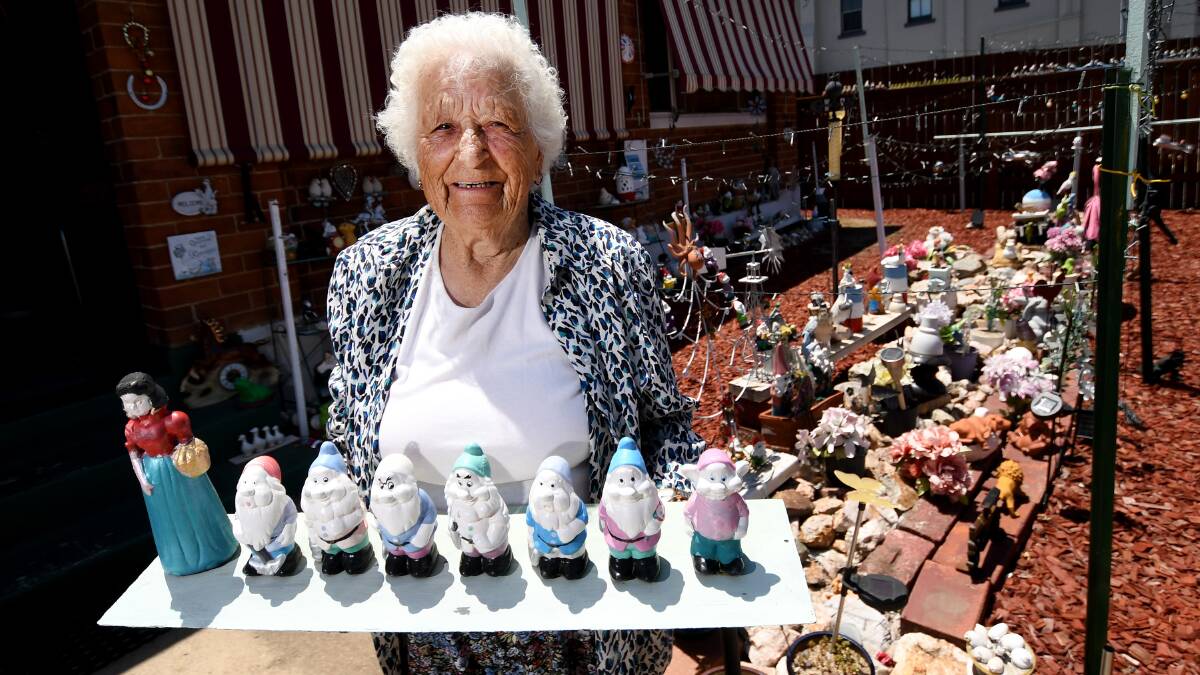 GNOMEVILLE: Julia Gregory with the set of gnomes that started her collection. Photo: Gareth Gardner