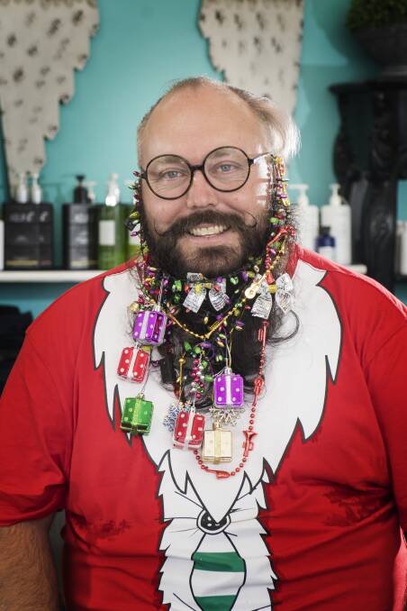 CREATIVE STYLE: Tamworth beard appreciator Gavin Moffat has styled his beard with a distinct Christmas theme this year. Photo: Peter Hardin