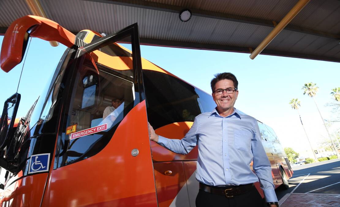 ALL ABOARD: MP Kevin Anderson at the launch of the regional bus service. Photo: Gareth Gardner