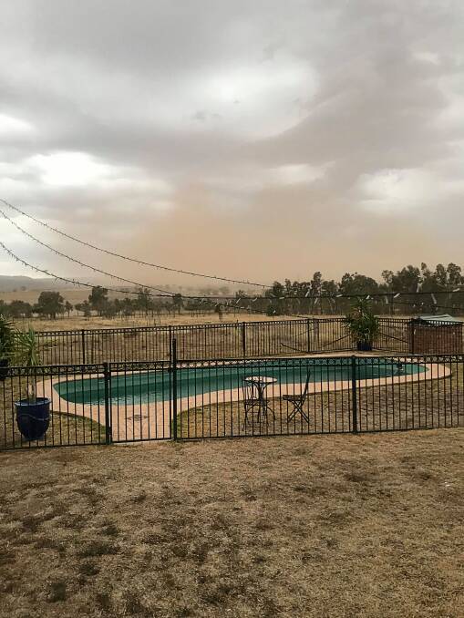 WILD WEATHER: Strong wind gusts and rain kicked up the dust outside of Tamworth. Out at Loomberah residents could see a significant amount of dust in the air. Photo: Trish Thornberry.