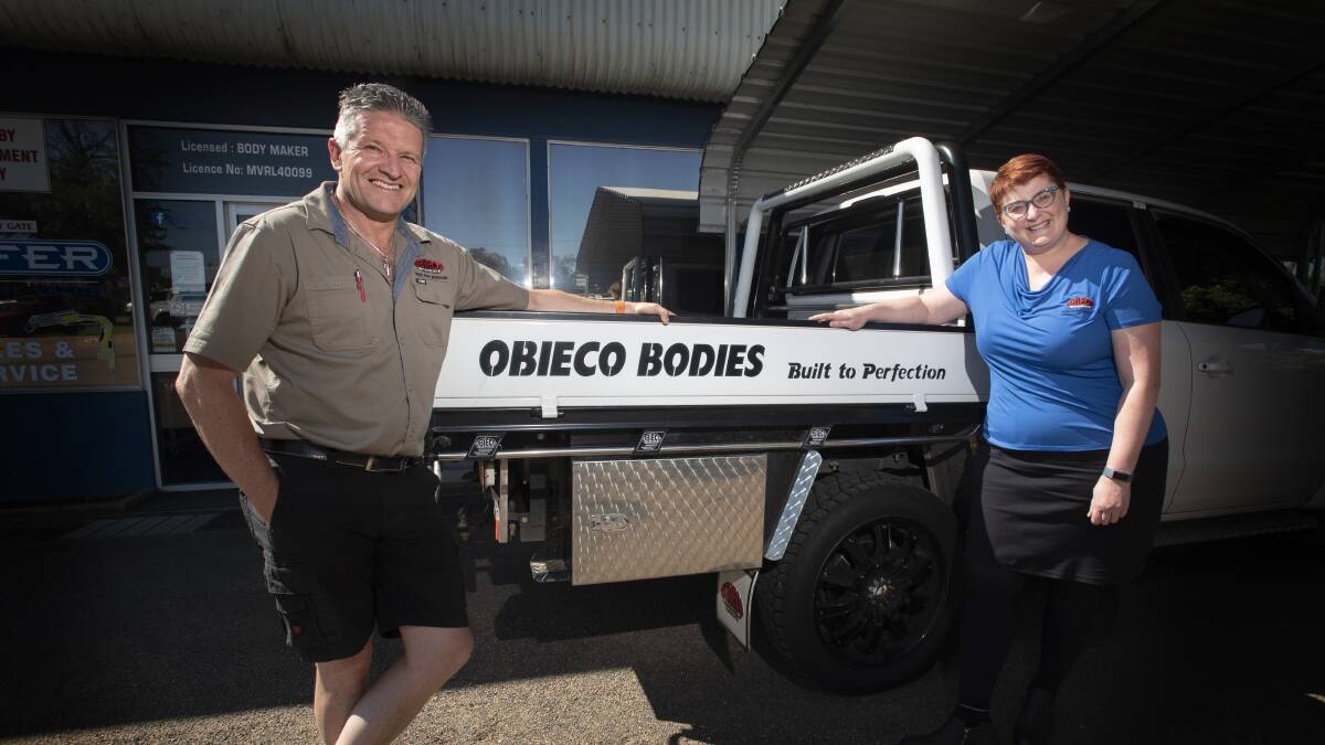 PASS IT ON: Tamworth Obieco Industries' Anthony Steel and Fiona Sweeney welcome the Reserve Bank rate cut. Photo: Peter Hardin 031120PHB005