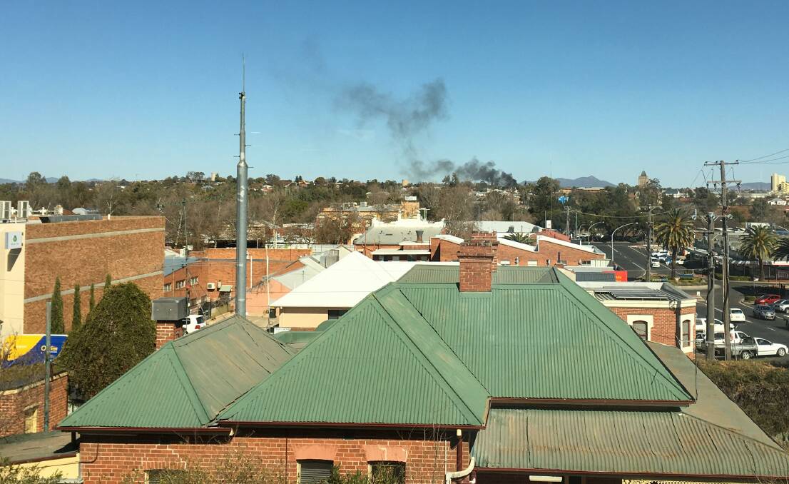 FIRE: Black plumes of smoke are visible from across town. Photo: Madeline Link
