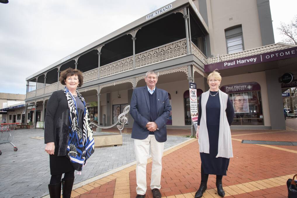 FRESH LOOK: The Strand owners Margaret and Robert O'Brien used the heritage fund to improve their building at the corner of Fitzroy Plaza and Peel Street, with Tamworth Regional councillor Juanita Wilson. Photo: Peter Hardin 210721PHA010