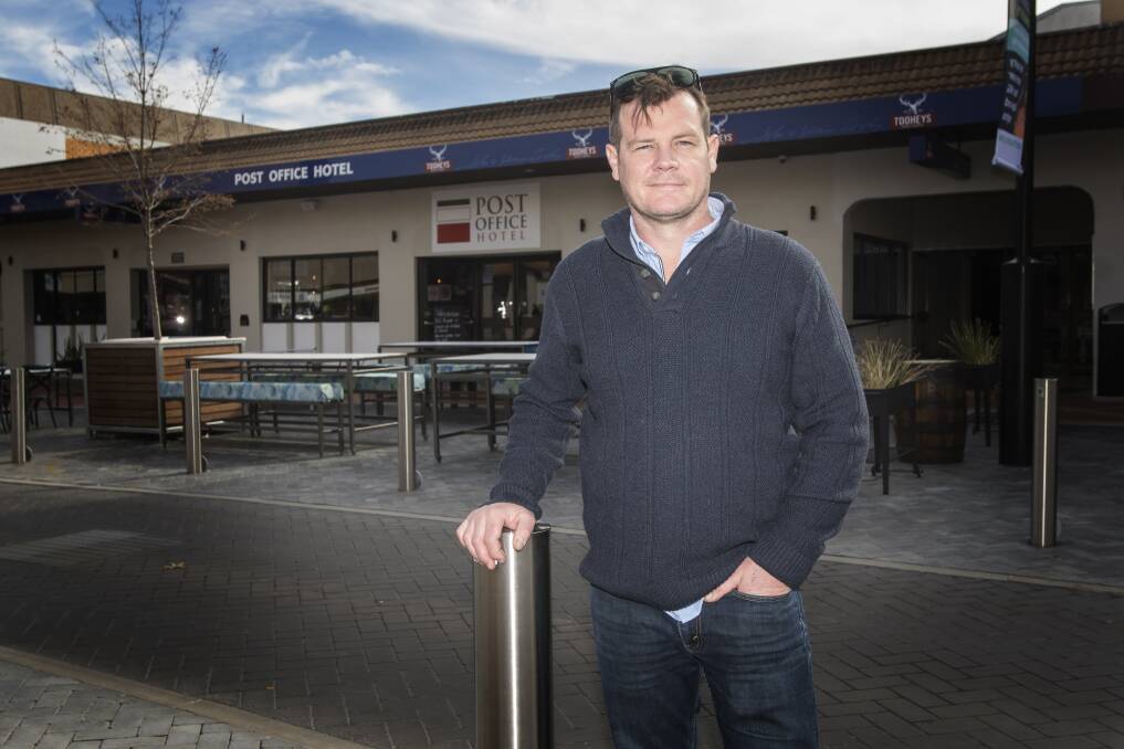 GOOD BUSINESS: Post Office Hotel publican Andrew Coutts said he expects patronage to pick up significantly in spring. Mr Coutts installed an outdoor dining area with the extra space afforded by the upgrade. Photo: Peter Hardin