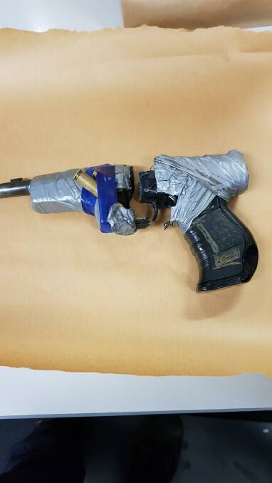 SEIZED: The imitation pistol Oxley Police District officers allegedly seized from Tyrone Langman and Sam Atwell in Tamworth.