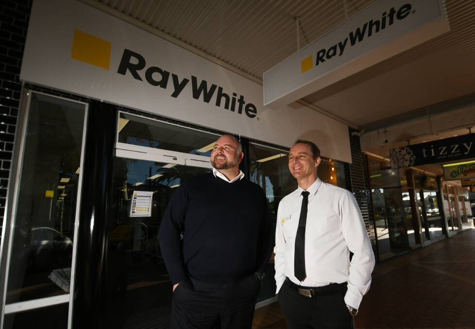 TIME TO BUY: Ray White Tamworth director Malcolm Campbell with real estate agent Jacob Hart. Photo: Gareth Gardner 170620GGC03