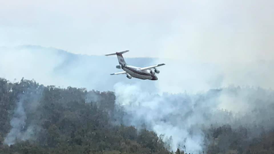ROCKVIEW FIRE: One of the aircraft in action at the Barraba Blaze. Photo: Wayne Keel and NSW RFS.