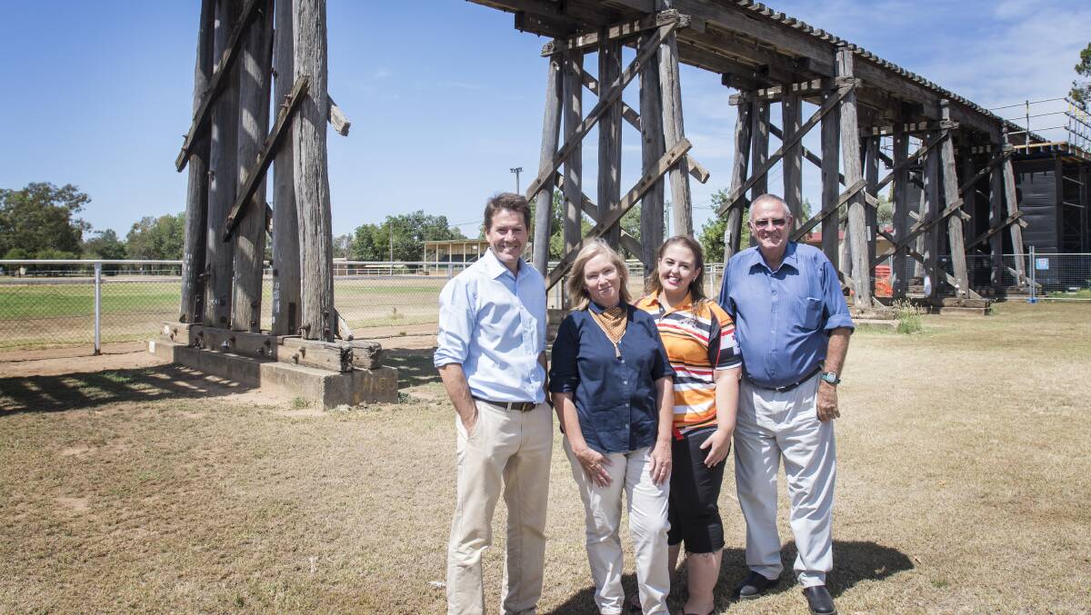 FUNDS: Tamworth MP Kevin Anderson, Lou Ellen Overton, Jessica Ride and councillor Jim Maxwell at the Manilla Showground on Monday. Photo: Peter Hardin