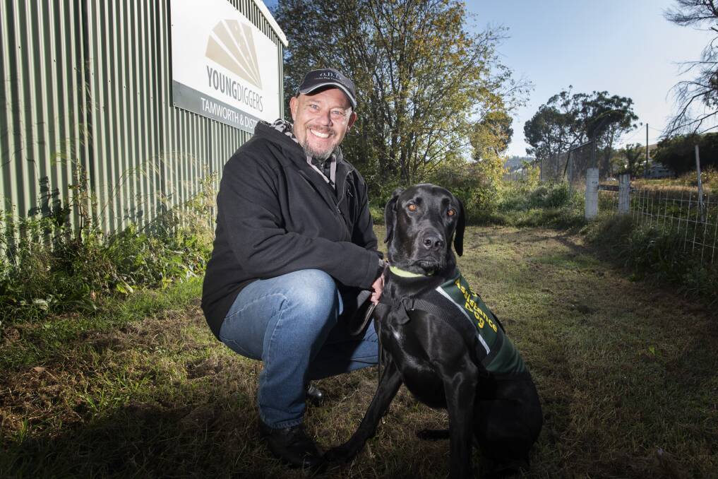 GOOD BOY: Young Diggers Tamworth trainer Dave Schell with assistance dog Lucky. Photo: Peter Hardin 040620PHA016