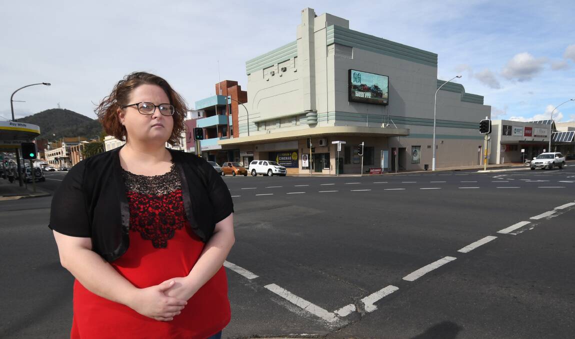 CURTAINS OPEN: Tamworth resident Courtney Carwood would like to see the old Regent Theatre restored to its former glory. Photo: Gareth Gardner