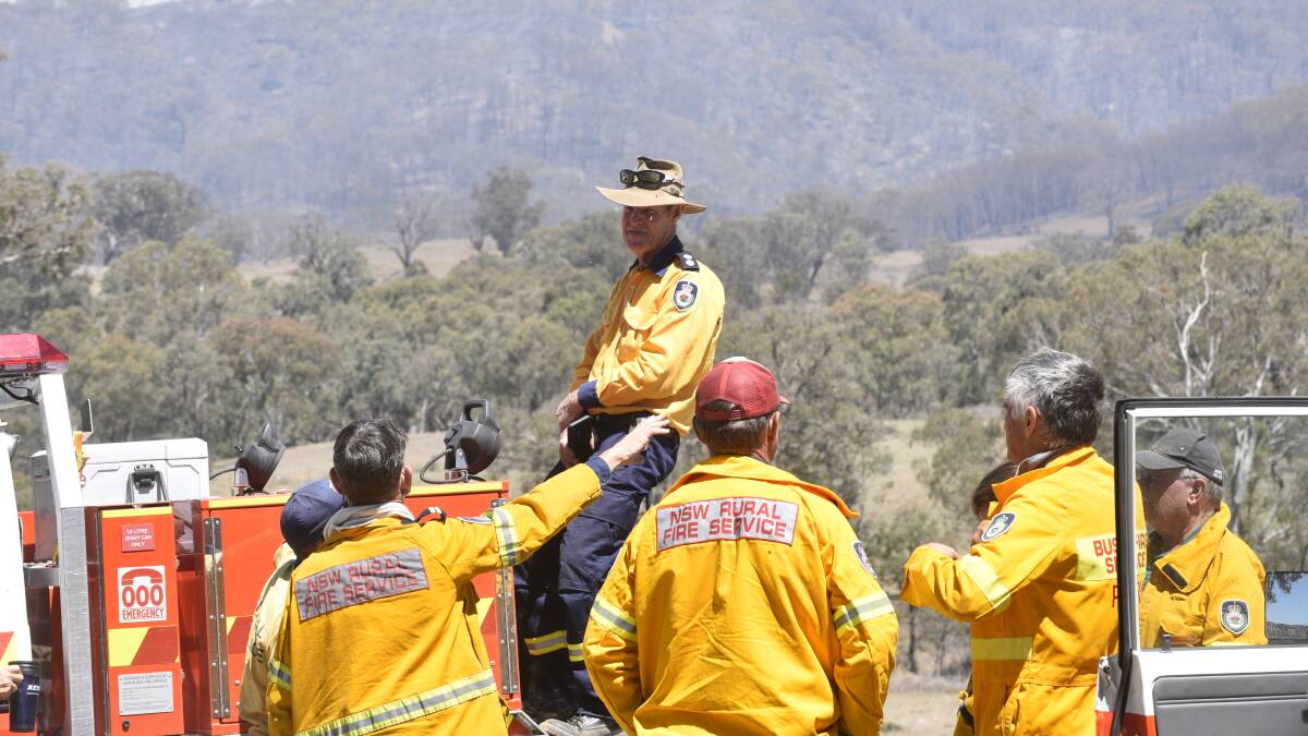 BUSY: NSW Rural Fire Service volunteer crews at a suspected deliberately lit blaze at Moonbi in November. Photo: Jacob McArthur