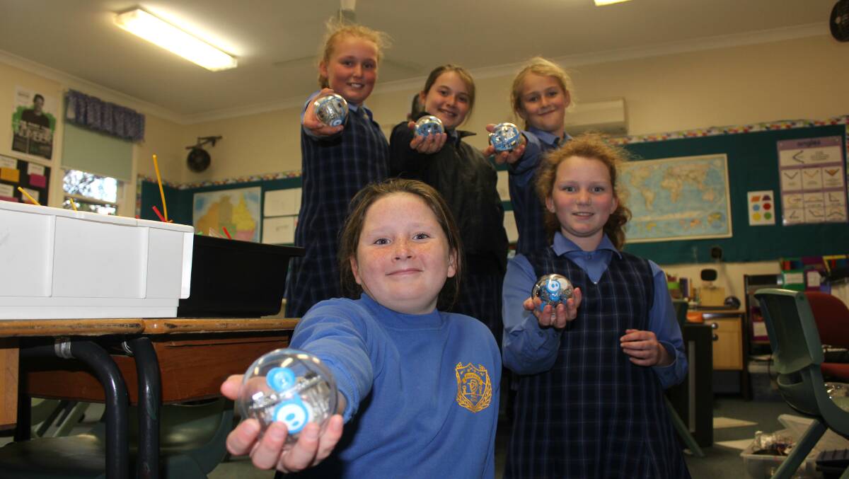 ROBOTICS: Nundle Public School students with Sphero, the robot from Star Wars. Photo: Madeline Link