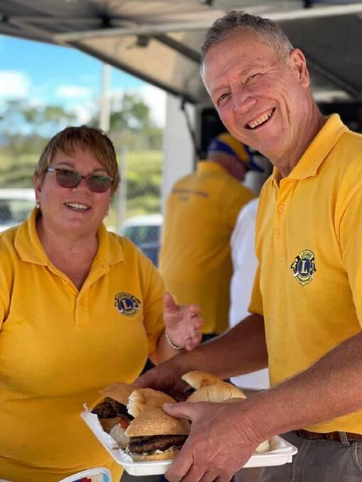 HARD WORKER: Lions Club members Kim Rhodes and Rod Stanford.