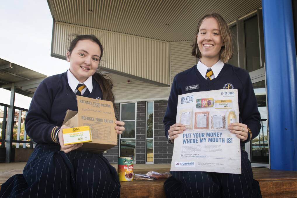 HUNGER PAINS: Meg Sheppard and Molly Johns are doing the ration challenge, where they eat the same rations given to a Syrian refugee for a week to raise funds for people in Jordan. Photo: Peter Hardin