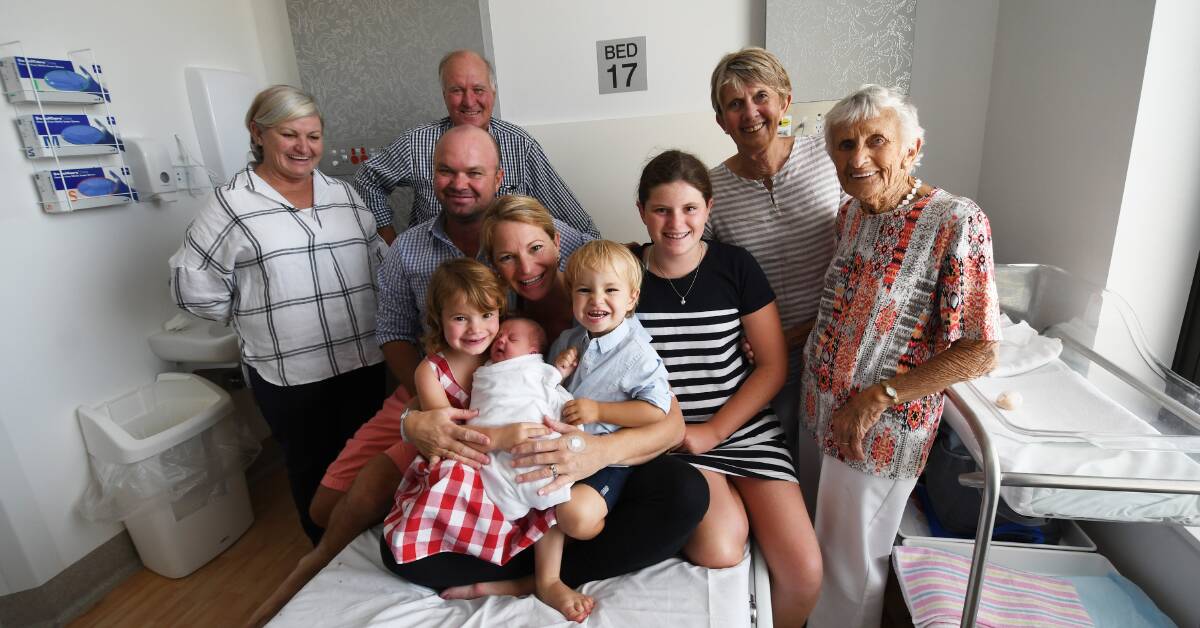 BUNDLE OF JOY: Jenny Hill, Tony Windsor, Andrew and Hannah Windsor with children Molly, Matilda, Max and the new baby, grandmother Lyn Windsor and great-grandmother Betty Cross. Photo: Gareth Gardner