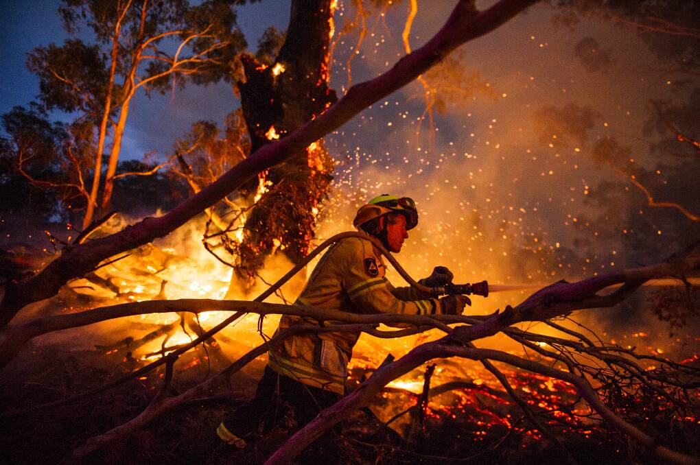 BLACK SUMMER: NSW RFS volunteers battled horrific megafires across the state in 2019 to 2020. Photo: Dion Georgopolous