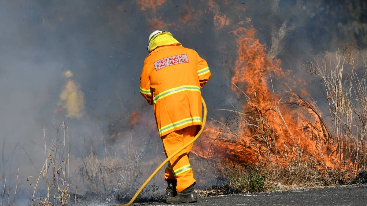 TOUGH CONDITIONS: NSW Rural Fire Service firefighters will keep an eye on two troubling blazes around Tamworth. Photo: File