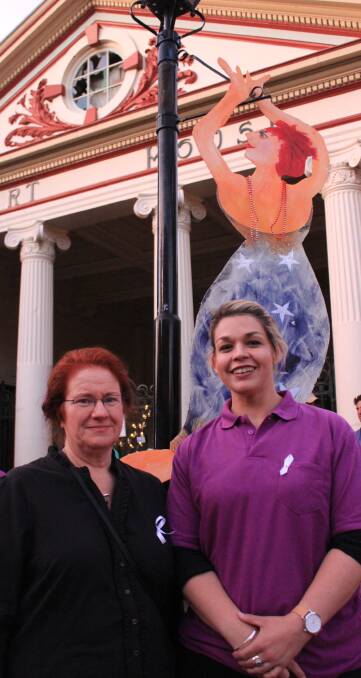 STAND UP: Domestic Violence Steering Committee members Carolyn Burgess and Terri King at the Reclaim the Night rally in the Beardy Street Mall on Friday.