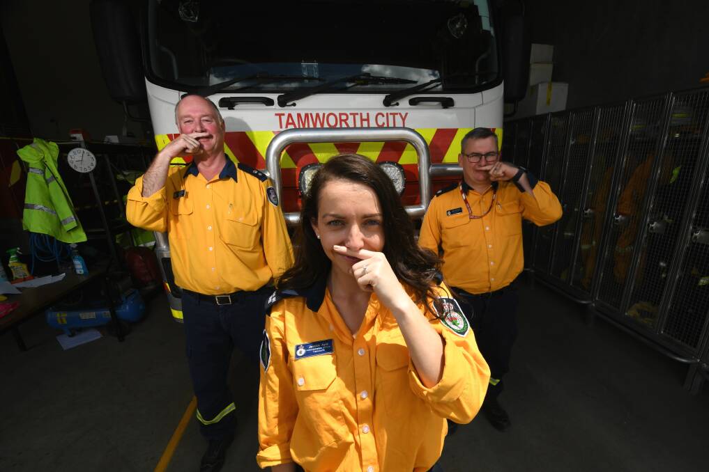 MOUSTACHE: Tamworth district Fire and Rescue NSW firefighters Allyn Purkiss, Jessica Ayre and Matt McKean. Photo: 021120GGA02