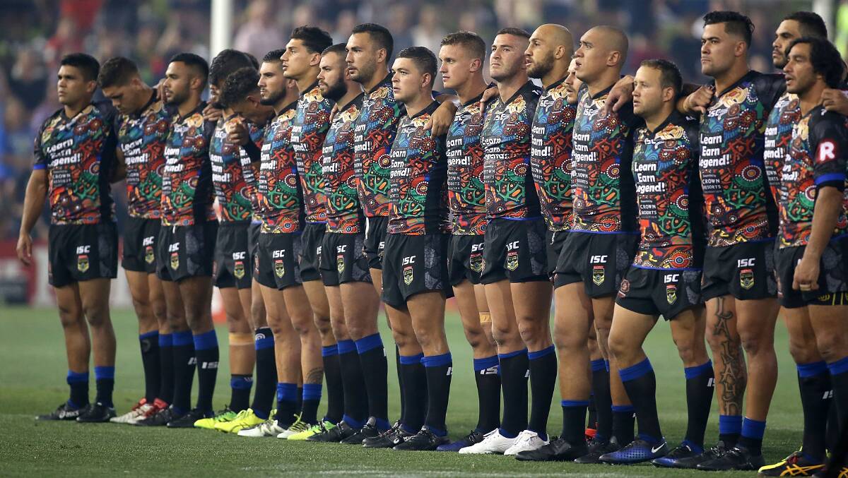 Stars of the show: Tingha export Bevan French (third from left) and the Indigenous All-Stars side on Friday night. Photo: Getty Images