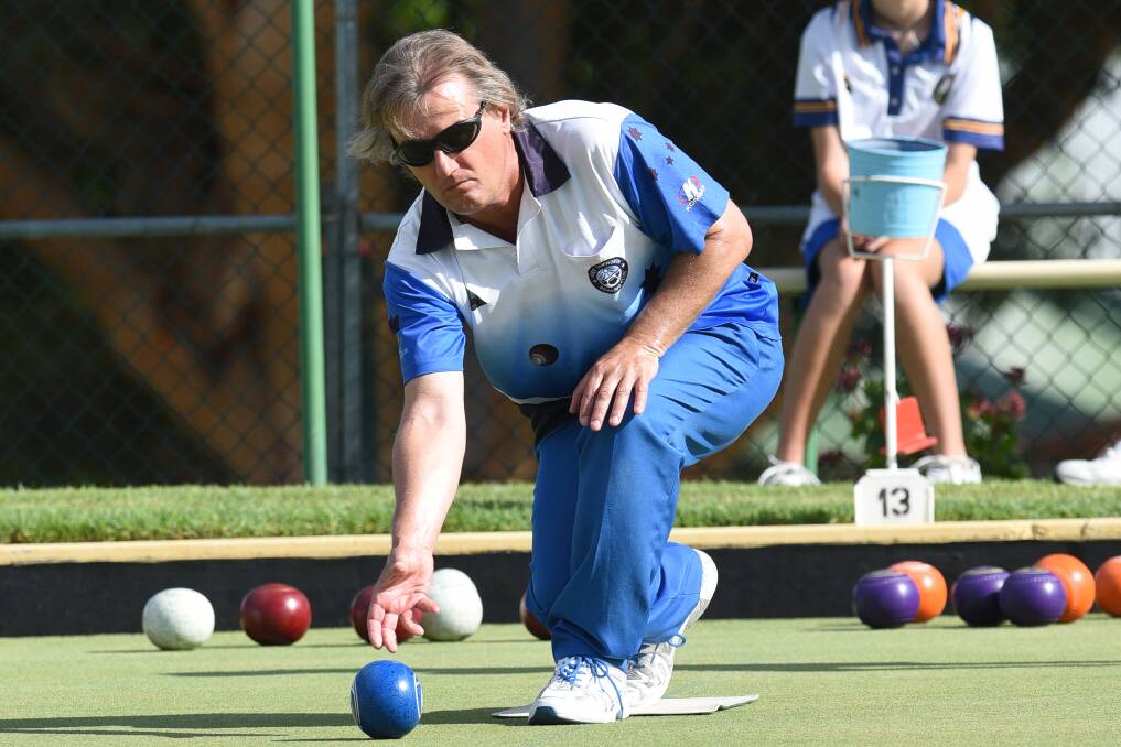 Focused: West Tamworth's Mick Flood delivered in spades on the green during the Willow Tree Triples on Sunday. Photo: Gareth Gardner 120217GGA02