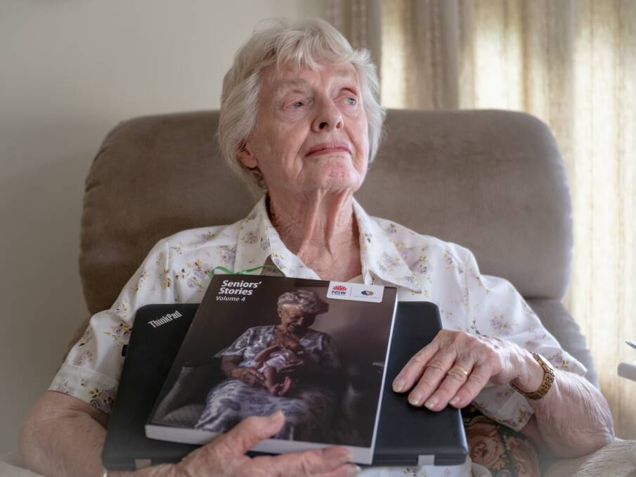 WRITER: Kathleen Gaukroger commemorates the publishing of one of her stories in Seniors' Stories Vol. 4, a publication of the NSW Government Seniors Card website. Photo: Rob Smith