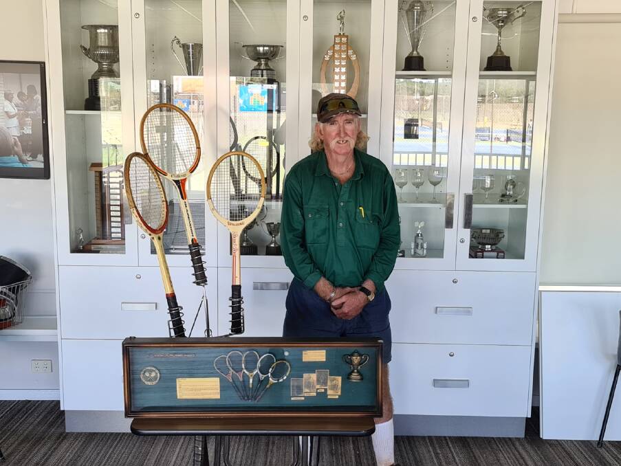 Inverell Tennis Club's Greg Fleming displaying some of the old memorabilia which will be out for viewing during the clubhouse opening.
