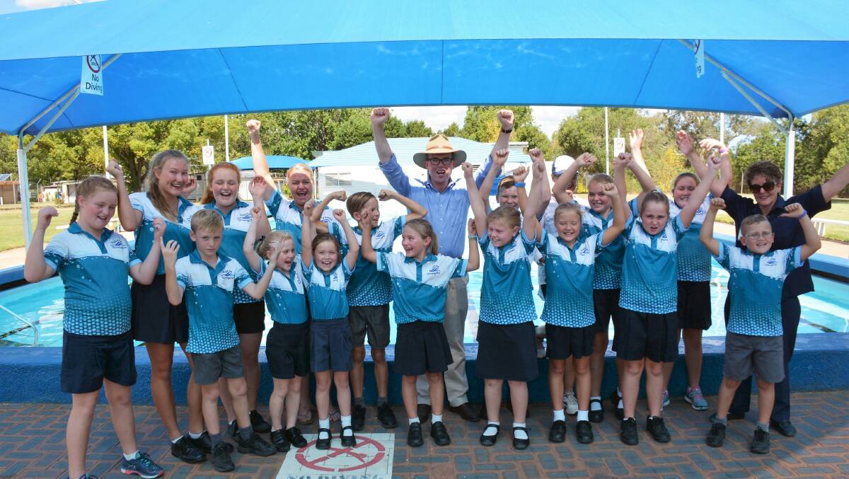 Bingara Swimming Club members are excited about the news of an upgraded pool. Club President Nicole Dixon, back row, third from left, Northern Tablelands MP Adam Marshall, Secretary Kylie Johnson and Gwydir Shire Councillor Tiffany Galvin, back right, are pictured with the club’s junior members last week.