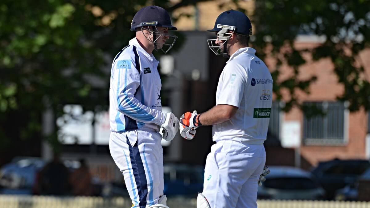 George Wilson (left) took a jaunt with skipper Chris Skilton to Singleton last weekend to scratch the cricket itch. Picture by Mark Bode. 