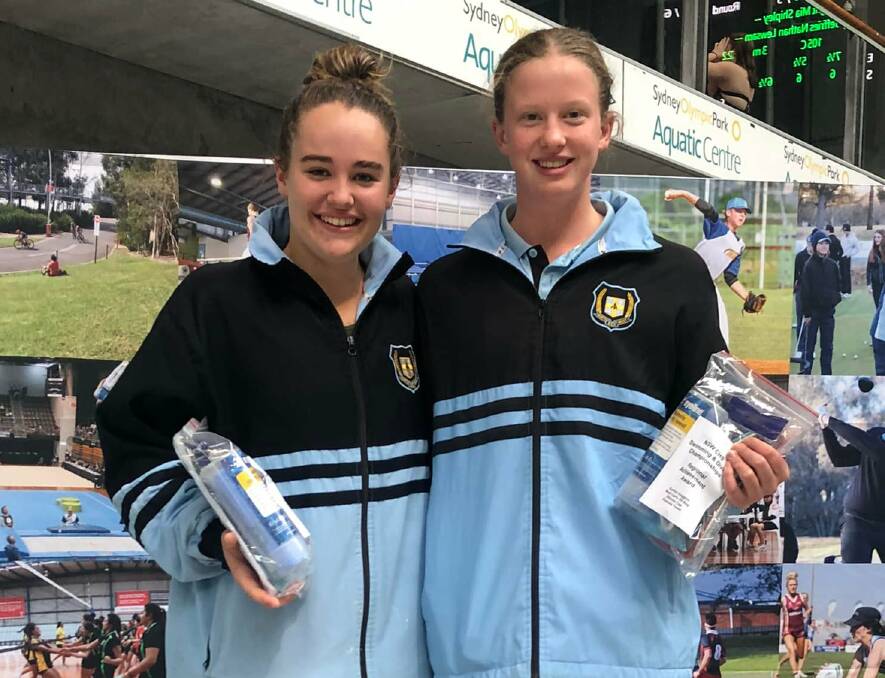 Recognised: Abbey Trewern (right) with Bree McGowan after the pair received Encouragement Awards during last week's championships. Photo: Supplied.