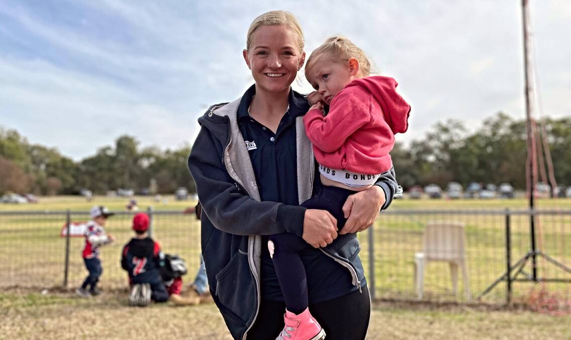 Hatch with her daughter, Ruby, during the 2023 season, who will cheer her mum on from the sidelines in 2024. Picture by Zac Lowe.