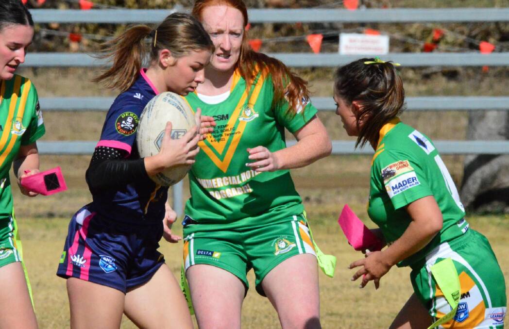 One-sided: Dungowan's Ellie New prepares to play the ball during the Cowgirls' thumping 34-0 victory on Saturday. Photo: Boggabri and District Rugby League Club Facebook. 