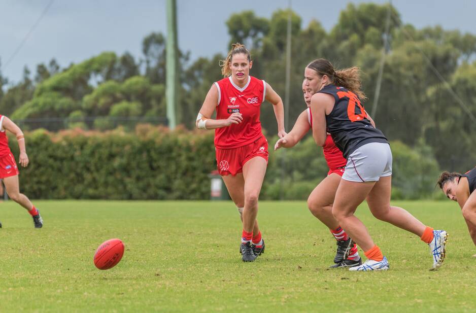 On the ball: Alice Mitchell is determined to make the most of her chance at selection in the Sydney Swans' inaugural AFLW side. Photo: Merrillie Redden Photography. 