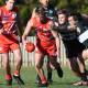Cody Beresford breaks through a tackle during the Swans' win over the New England Nomads on Saturday. Picture AFL North West Facebook.