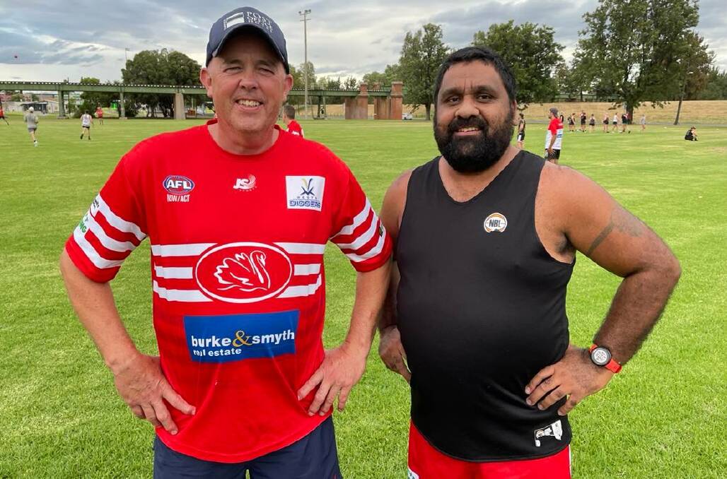 Joint leaders: Paul Kelly (left) with co-coach Jeff Talbot during the Swans' 2022 pre-season training. Photo: Zac Lowe.