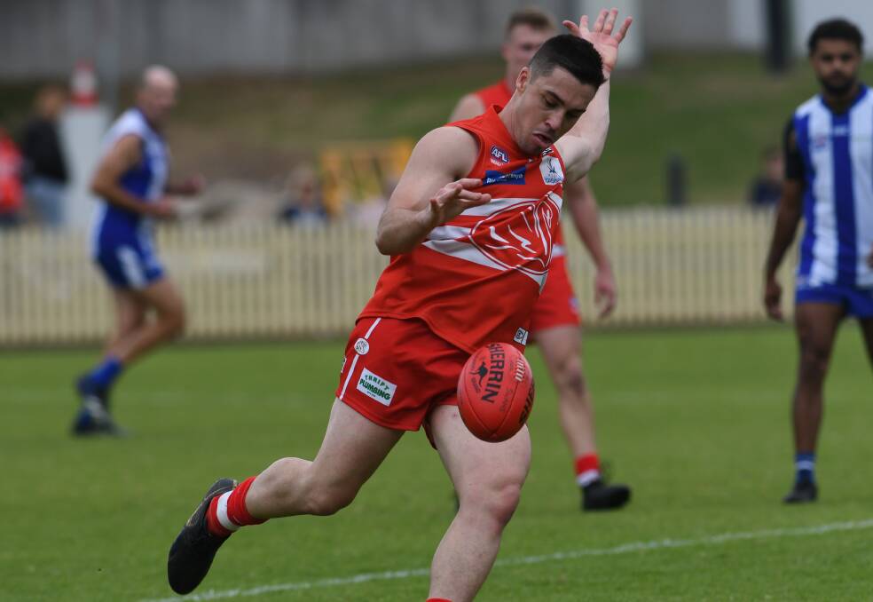 Kicking straight: Josh Jones, seen here during the Swans' derby game against the Kangaroos in round five, is averaging nearly four goals per game this year. Photo: Gareth Gardner.