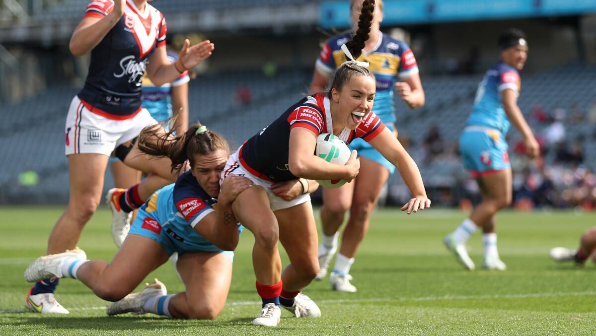 Jada Taylor can't hold back her glee as she crosses for her first NRLW try in her debut game on Sunday. Picture by Getty Images. 