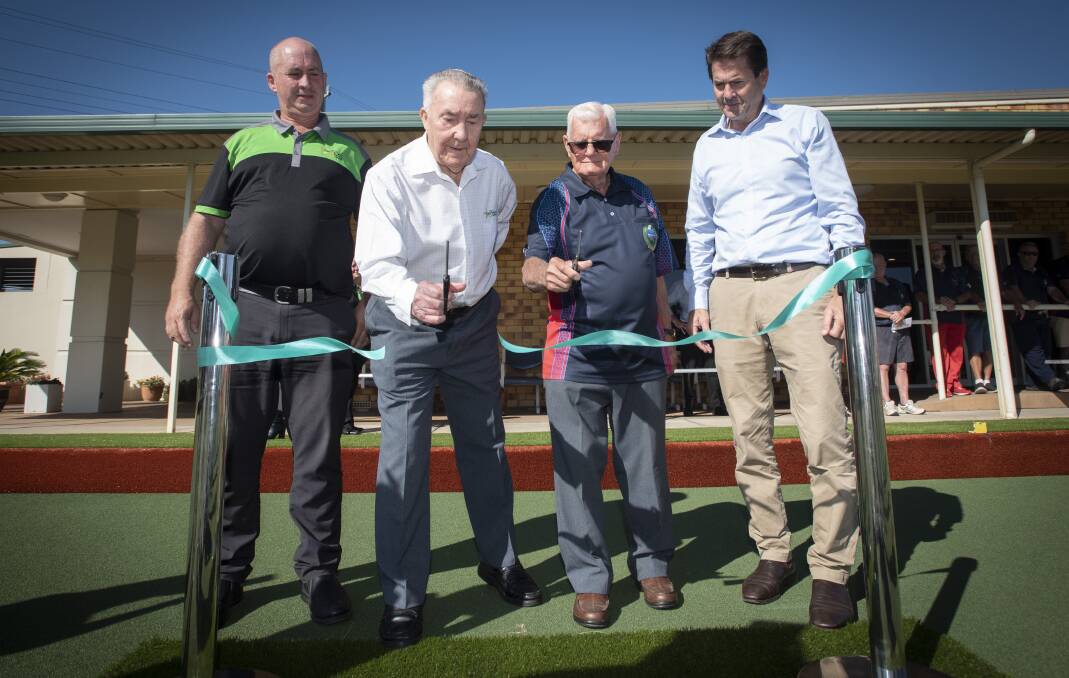 Opened: Kristian Brooks (left) and Member for Tamworth Kevin Anderson (right) watch on as Lloyd Johnston (centre left) and Jim Phillips cut the ceremonial ribbon. Photo: Peter Hardin.