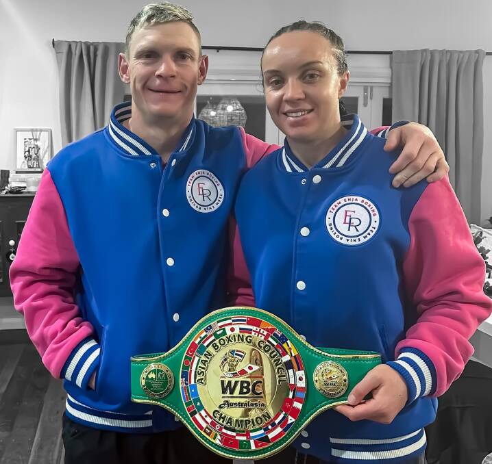Enja Ryan with her husband and training partner, Wade, shortly after her title win in Tamworth on Saturday. Picture by Team Enja.