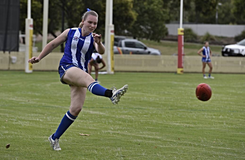 Young kicks the ball in the round two derby against the Tamworth Swans last year. Picture by Mark Bode.